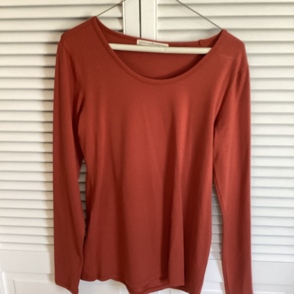 Peruvian top, size medium, in a beautiful paprika color.